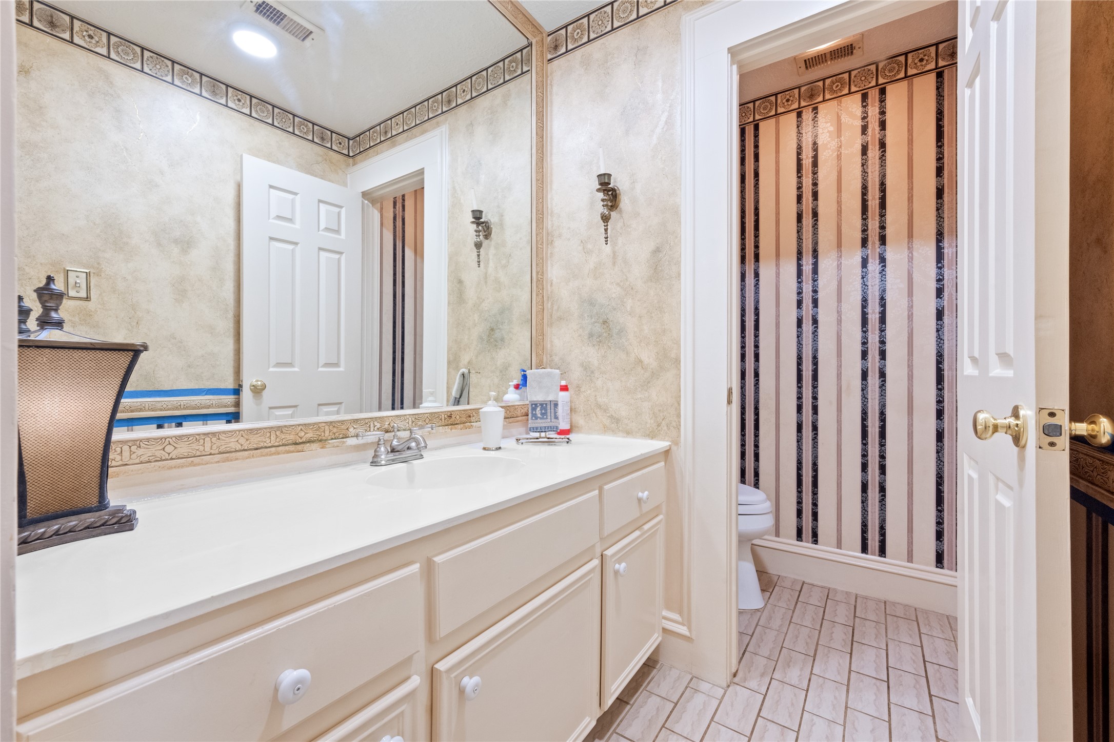 7639 Post Bridge Road Spring, TX 77389 - Photo 19 of 42 a bathroom with a sink and a mirror