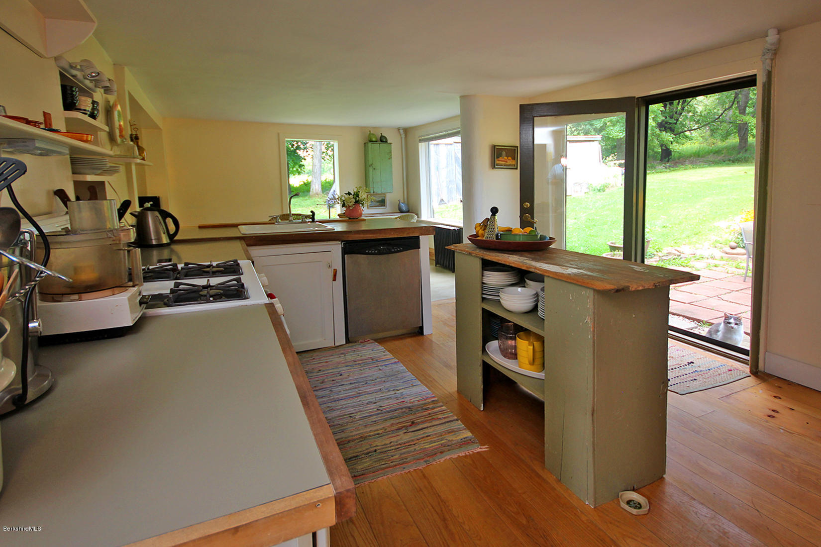 47 Main Road Tyringham, MA 01238 - Photo 13 of 31 a view of a living room and dining room