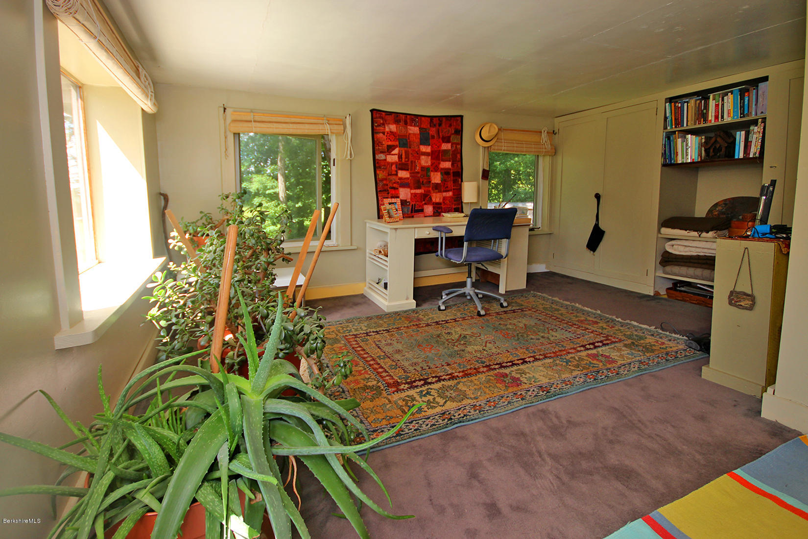 47 Main Road Tyringham, MA 01238 - Photo 19 of 31 a workspace with furniture window and a potted plant