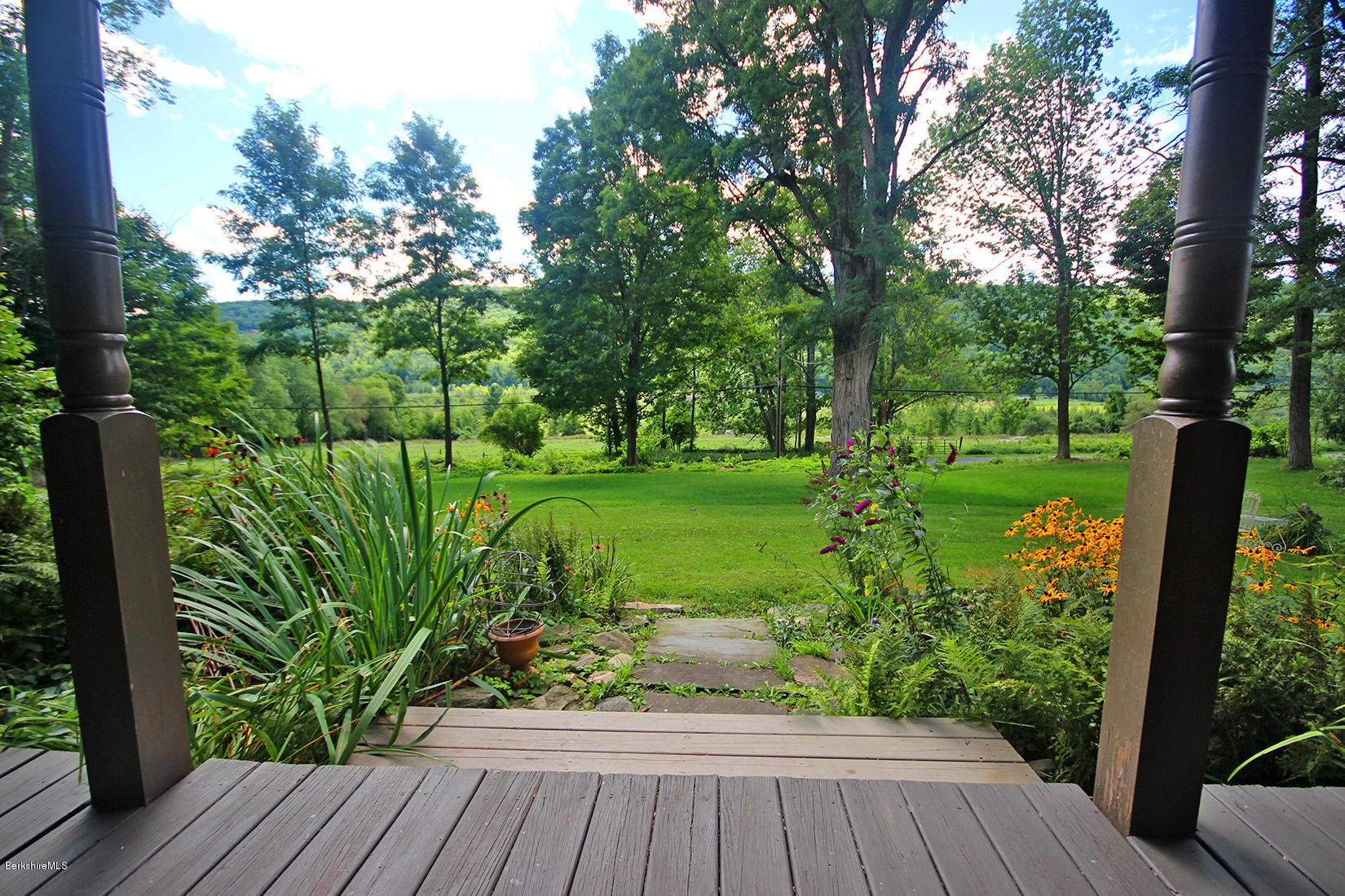 47 Main Road Tyringham, MA 01238 - Photo 4 of 31 a view of a garden with a large trees