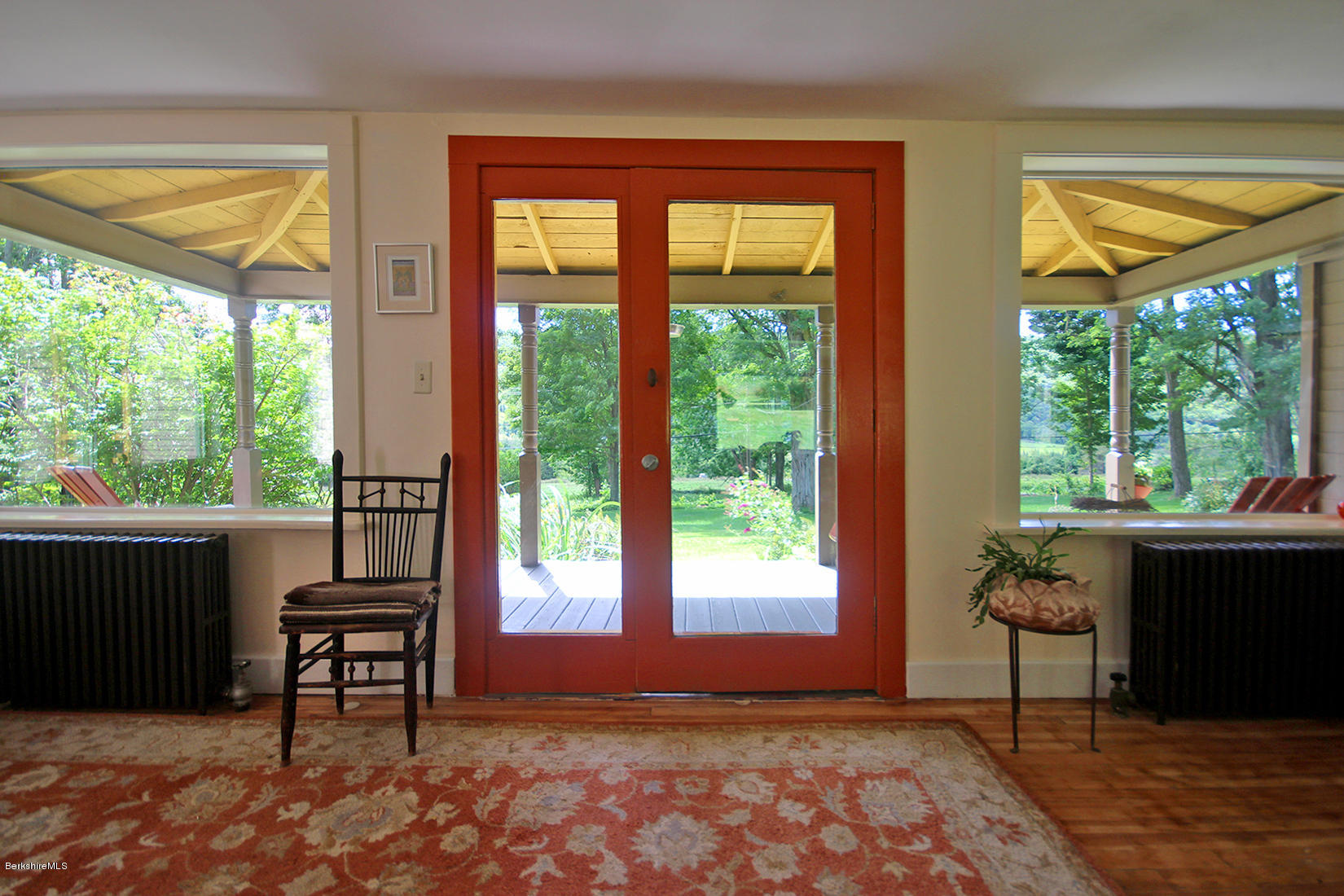47 Main Road Tyringham, MA 01238 - Photo 5 of 31 a bedroom with a bed and a window