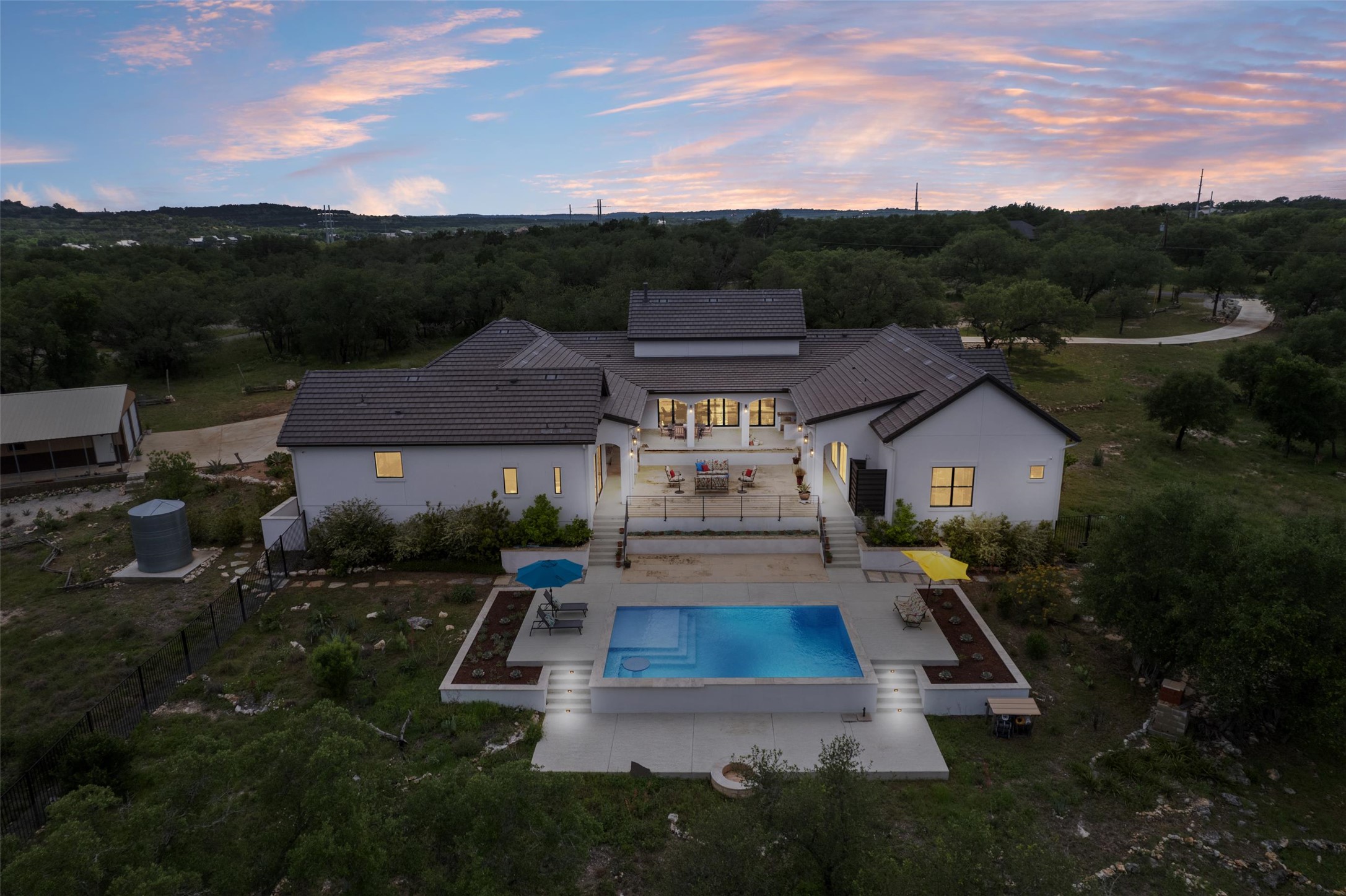 1805 Performer Road Spicewood, TX 78669 - Photo 32 of 40 a view of house with garden