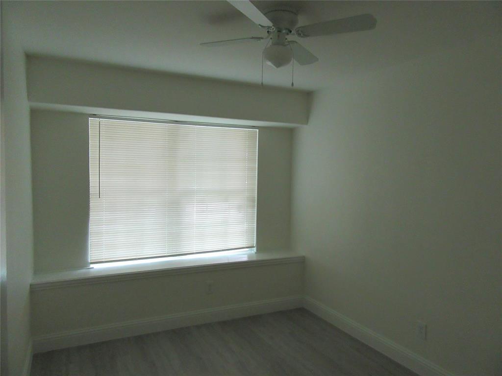 2209 Merrimac Lane Lancaster, TX 75146 - Photo 7 of 11 an empty room with a window