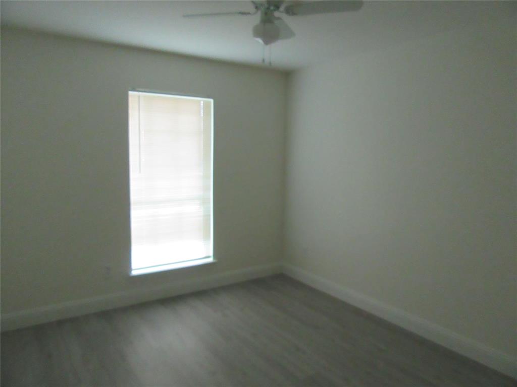 2209 Merrimac Lane Lancaster, TX 75146 - Photo 9 of 11 an empty room with a window