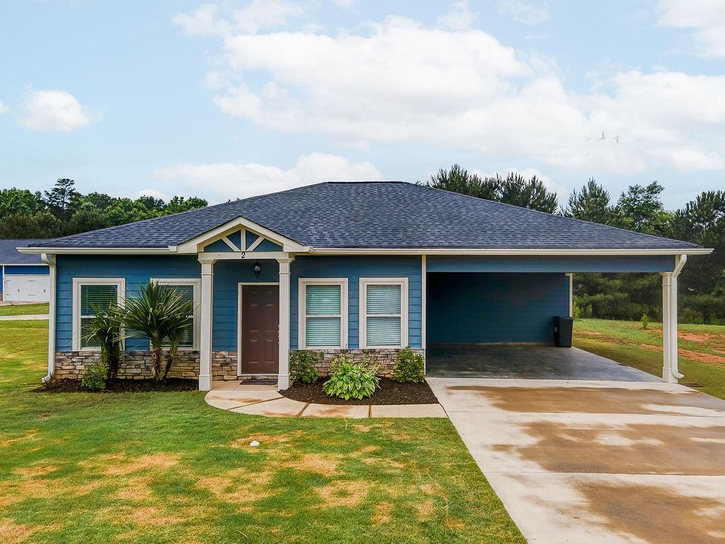 2 Birchwood Circle Southwest Rome, GA 30165 - Photo 1 of 1 a front view of a house with a yard