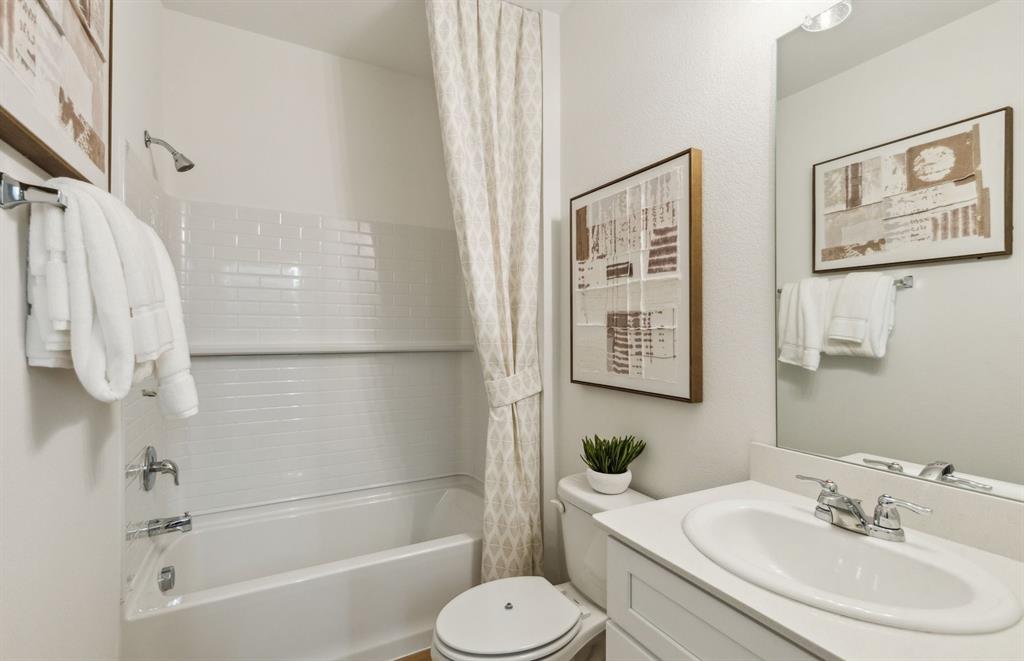 7505 Bent Gale Road Pilot Point, TX 76258 - Photo 20 of 20 a bathroom with a sink toilet and shower