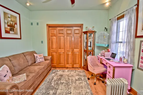 a living room with furniture and a window