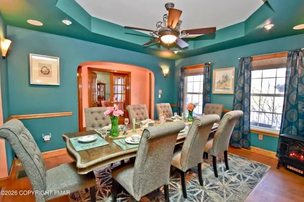 a view of a dining room with furniture window and outside view