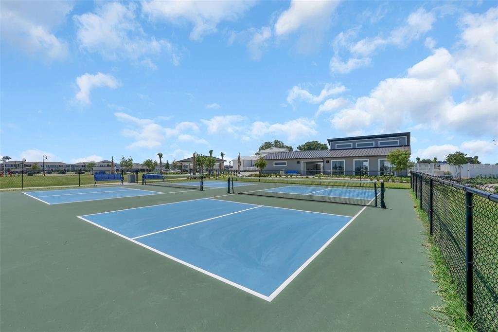 5768 Stephens Road St. Cloud, FL 34771 - Photo 45 of 50 a view of an outdoor space and tennis court