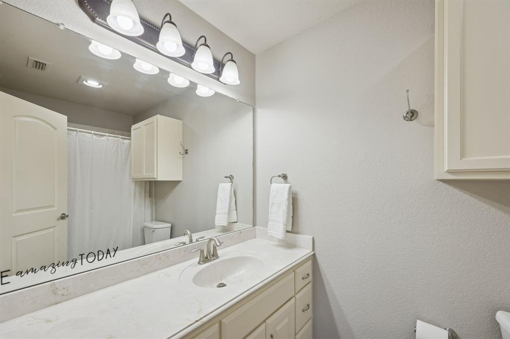 1520 Snider Court Lucas, TX 75002 - Photo 28 of 40 Ensuite Bathroom to bedroom 4 upstairs has tub and shower, long countertop and ample cabinet storage.