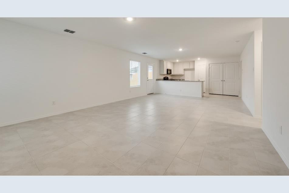 9832 Trusler Road Fort Worth, TX 76179 - Photo 11 of 13 a view of a kitchen with a sink and cabinets