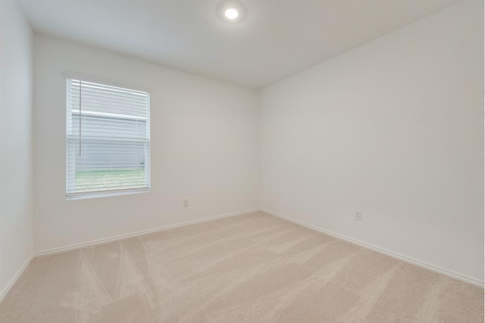9832 Trusler Road Fort Worth, TX 76179 - Photo 12 of 13 an empty room with a window