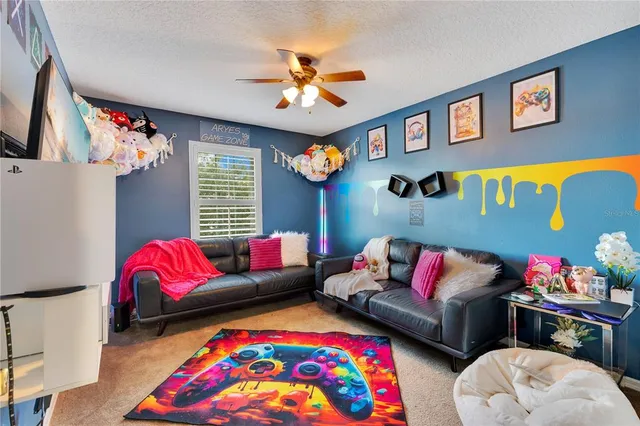 a living room with furniture and a couch
