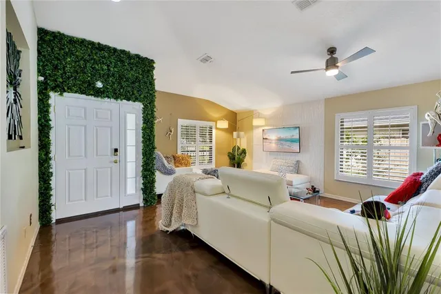 a bed room with a bed and a window