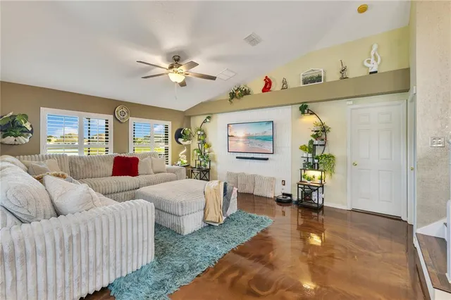 a living room with furniture and a window