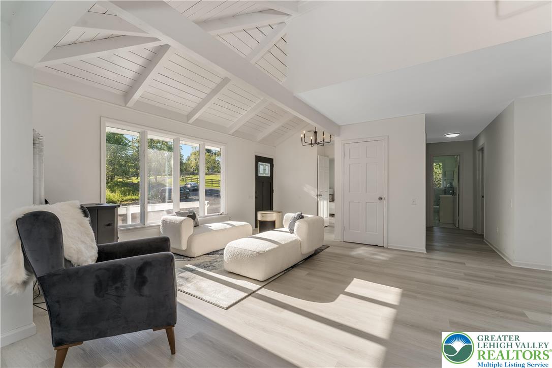 1855 Ridge Road Bangor, PA 18013 - Photo 12 of 53 a living room with furniture and large windows
