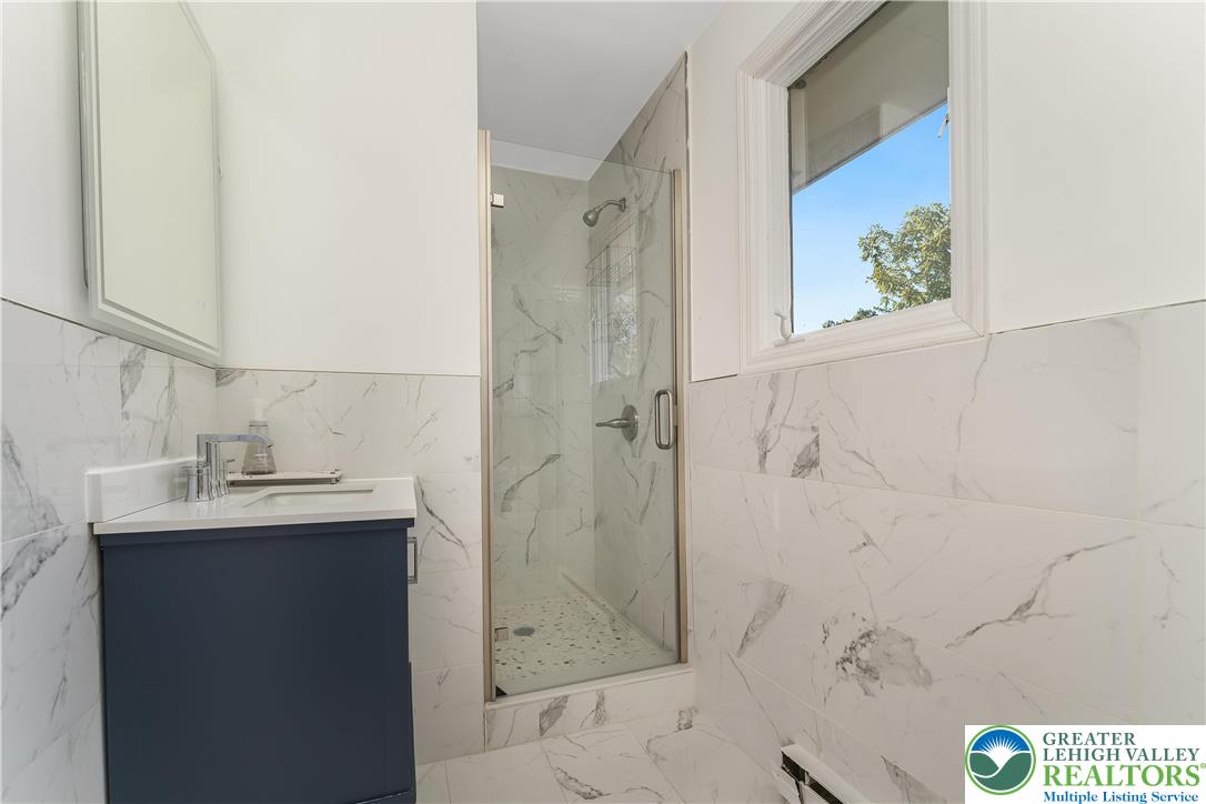 1855 Ridge Road Bangor, PA 18013 - Photo 21 of 53 a bathroom with a shower and a sink
