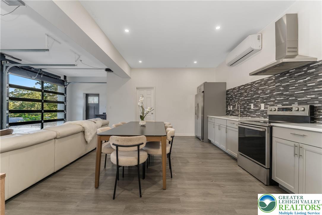 1855 Ridge Road Bangor, PA 18013 - Photo 35 of 53 a kitchen with a table chairs stove and cabinets