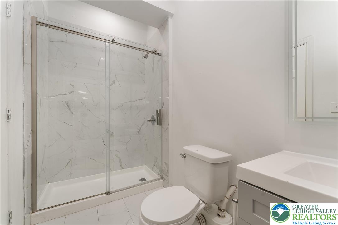 1855 Ridge Road Bangor, PA 18013 - Photo 36 of 53 a white toilet next to a bathroom