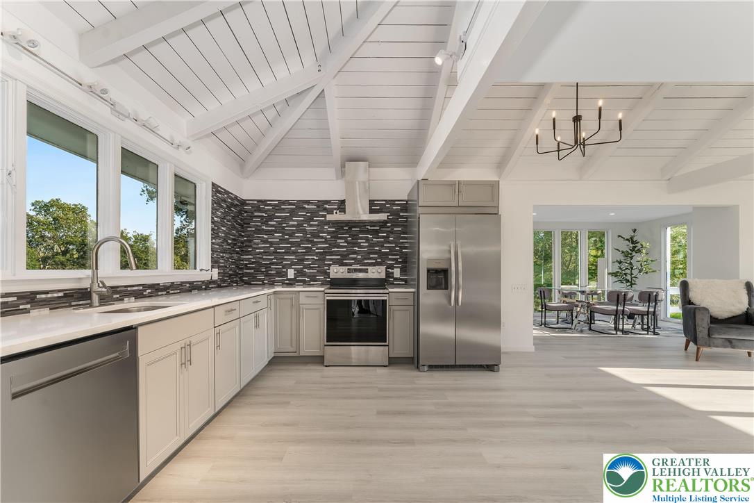 1855 Ridge Road Bangor, PA 18013 - Photo 9 of 53 a kitchen with stainless steel appliances granite countertop a sink and cabinets