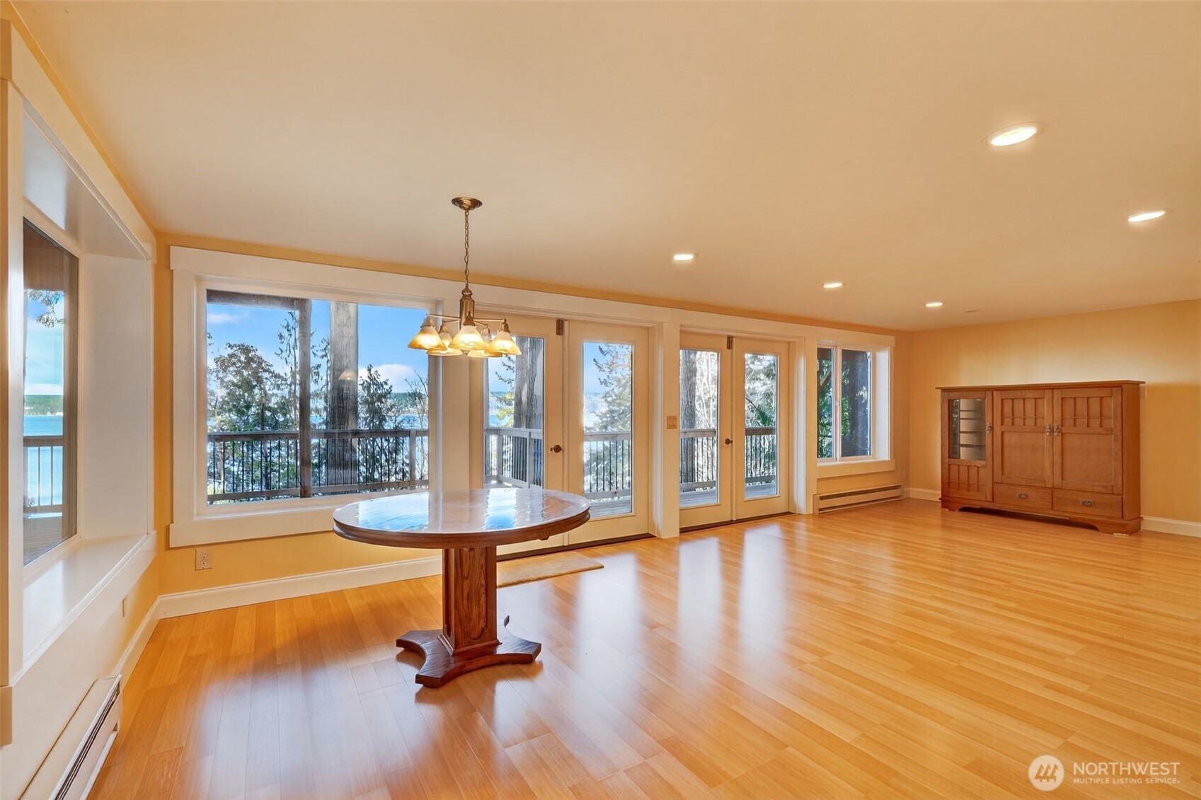 510 Carl Johnson Road Quilcene, WA 98376 - Photo 21 of 37 a view of a room with wooden floor water view and pool table