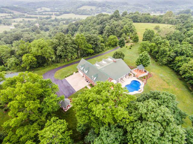This custom home was built to provide maximum privacy and to capture the glorious countryside views.