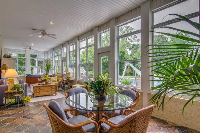 4235 Fairview Road Columbia, TN 38401 - Photo 18 of 20 A 47x12 sunny terrace room, with hot tub, overlooks a lovely landscaped patio and pool.