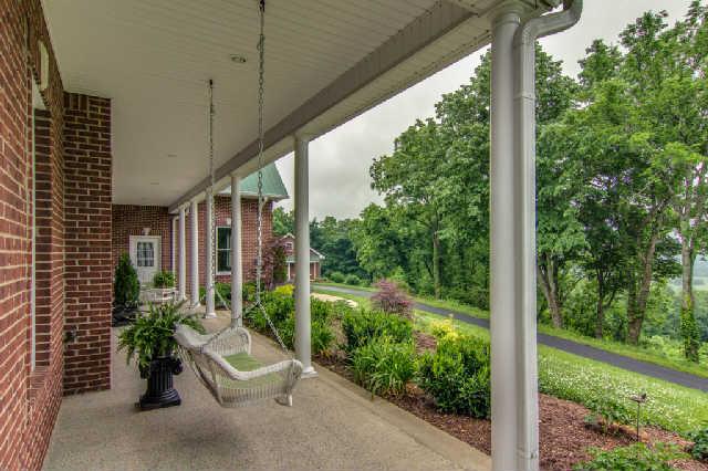 4235 Fairview Road Columbia, TN 38401 - Photo 5 of 20 Relax and enjoy the views from this long, 372 sq. ft. covered front porch.