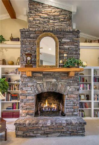 4235 Fairview Road Columbia, TN 38401 - Photo 8 of 20 A huge lodge-like rock fireplace dominates this beautiful living room.