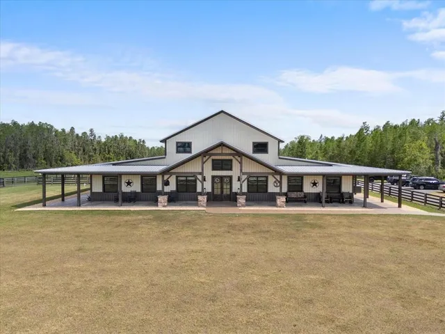 a view of a house with a swimming pool