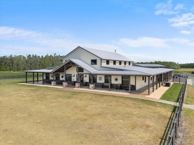 front view of a house with a swimming pool