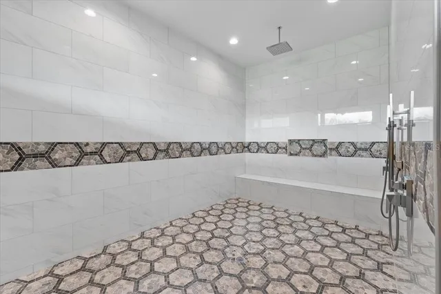 a bed room with a bed and a window