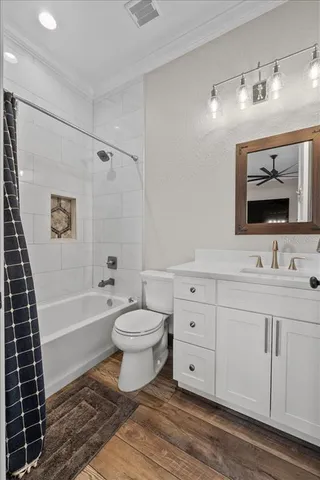 a living room with furniture a flat screen tv and a large window