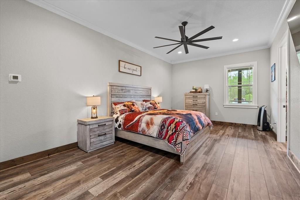 11657 Moore Road Lakeland, FL 33809 - Photo 32 of 100 a bed room with a bed and a window