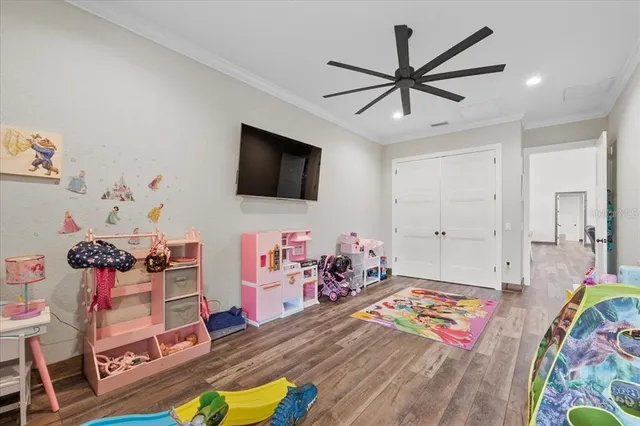 a kitchen with refrigerator a stove and cabinets