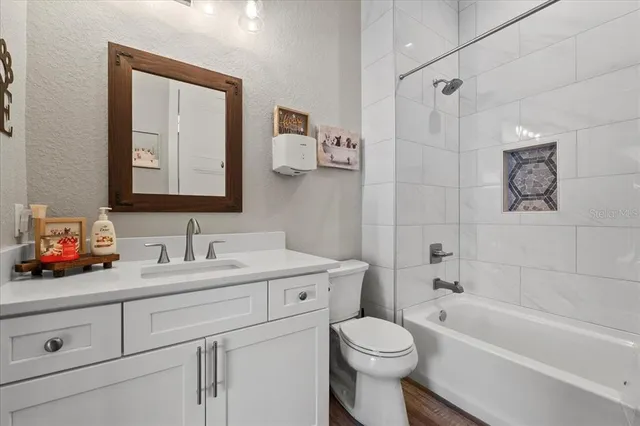 a white bath tub sitting in a bathroom
