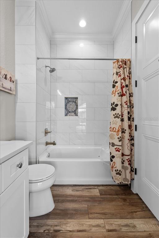 11657 Moore Road Lakeland, FL 33809 - Photo 36 of 100 a bathroom with a bathtub and a toilet