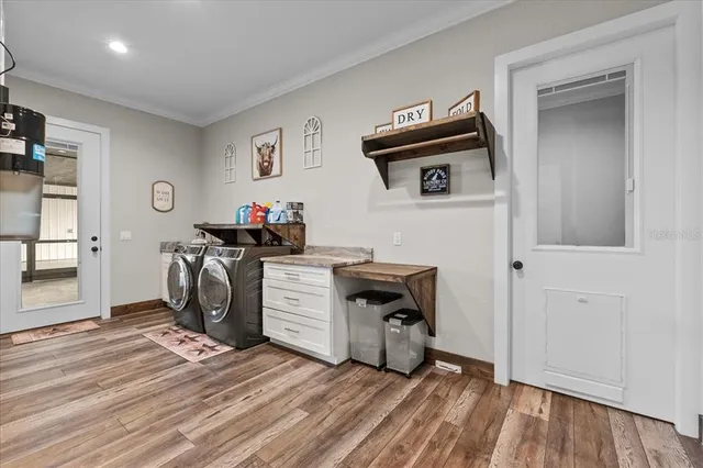 a children room with toys and a flat screen tv