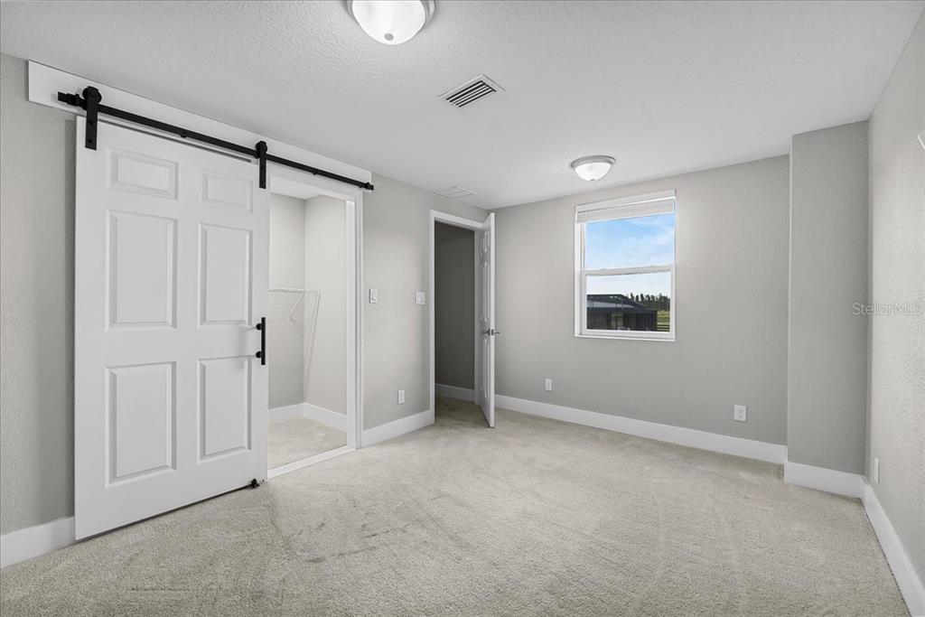 11657 Moore Road Lakeland, FL 33809 - Photo 91 of 100 a view of an empty room with a window