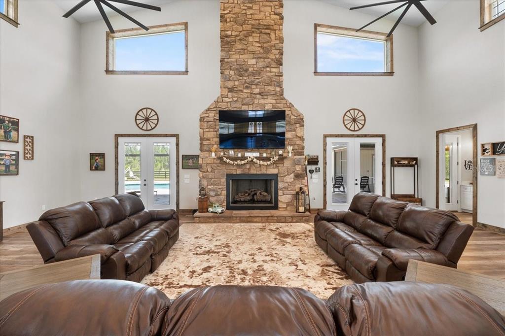 11657 Moore Road Lakeland, FL 33809 - Photo 10 of 100 a living room with furniture or couch and a fireplace