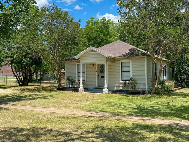 a view of a house with a swimming pool