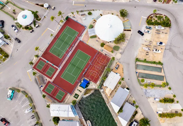 an aerial view of a house swimming pool and outdoor space