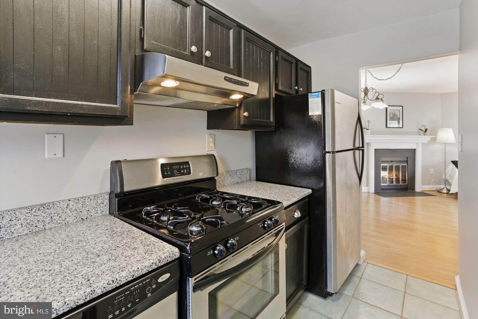 2604 Tunlaw Road Northwest, Unit 5 Washington, DC 20007 - Photo 8 of 28 STAINLESS APPLIANCES & GRANITE COUNTERS