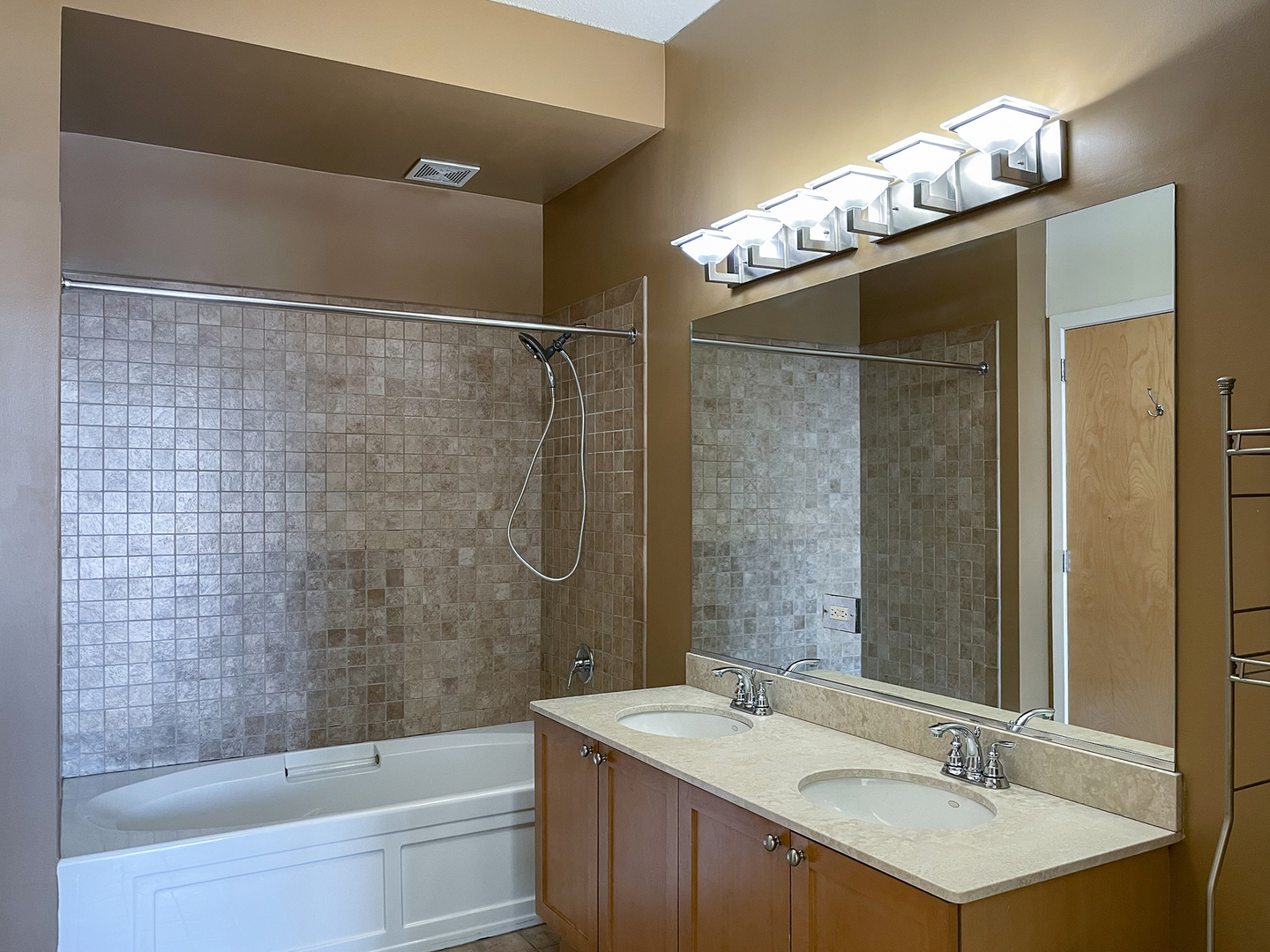 321 South Sangamon Street, Unit 604 Chicago, IL 60607 - Photo 13 of 24 a bathroom with a sink and a mirror