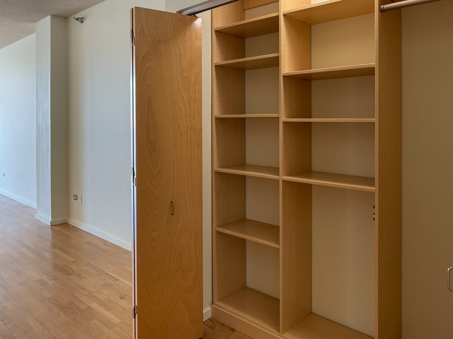 321 South Sangamon Street, Unit 604 Chicago, IL 60607 - Photo 7 of 24 a view of walk in closet with empty racks