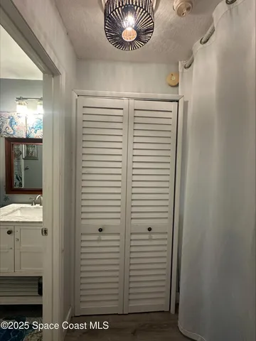 a view of a hallway with entryway