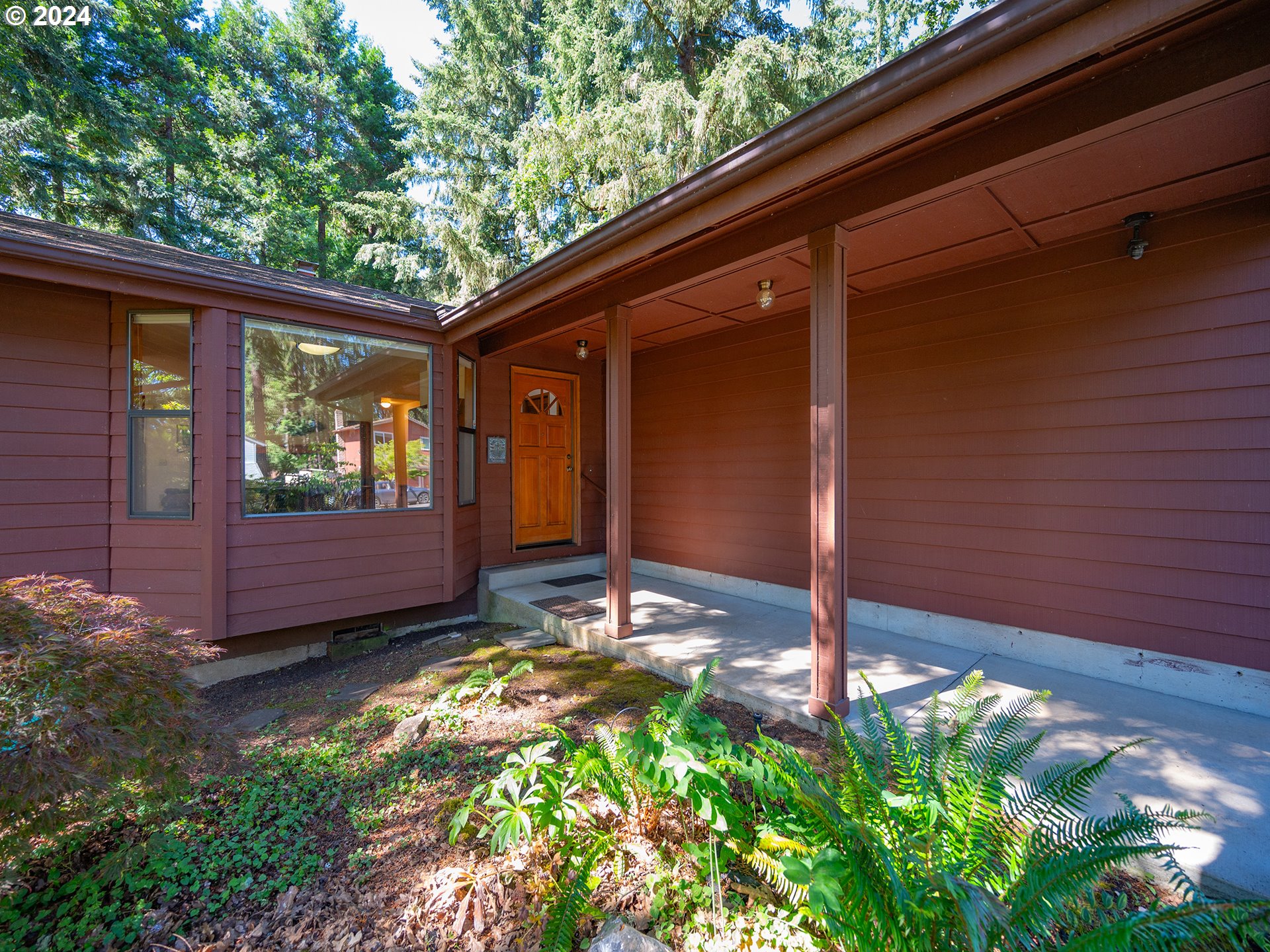 1778 West 27th Place Eugene, OR 97405 - Photo 2 of 43 a view of a backyard with garden