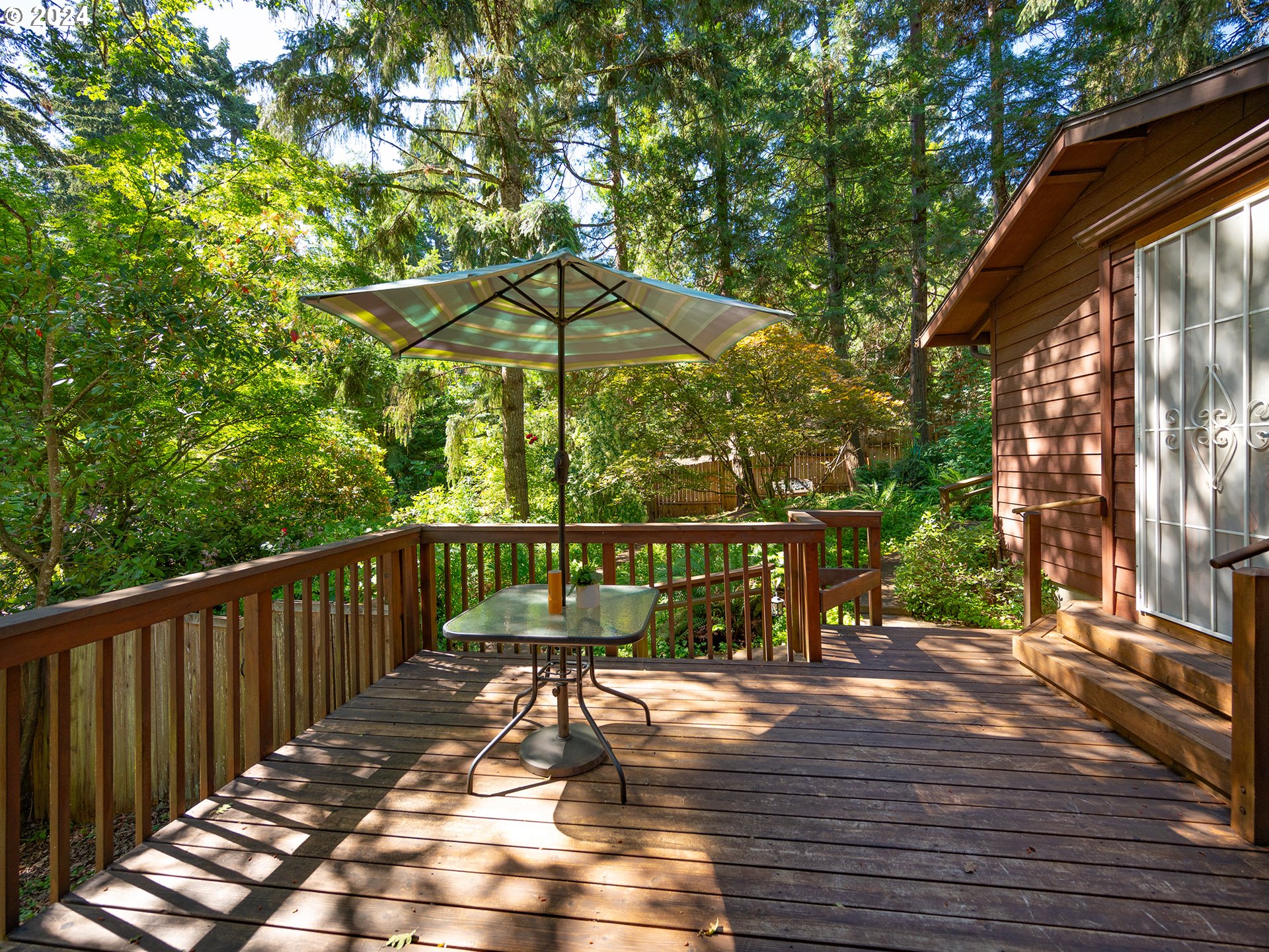1778 West 27th Place Eugene, OR 97405 - Photo 30 of 43 a view of balcony with wooden floor and outdoor seating