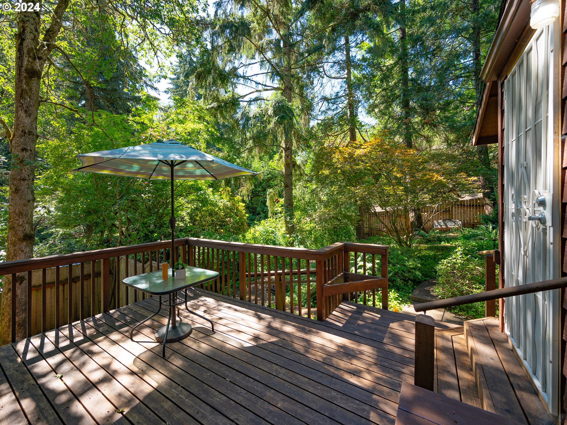 1778 West 27th Place Eugene, OR 97405 - Photo 31 of 43 a view of balcony with wooden floor and outdoor seating