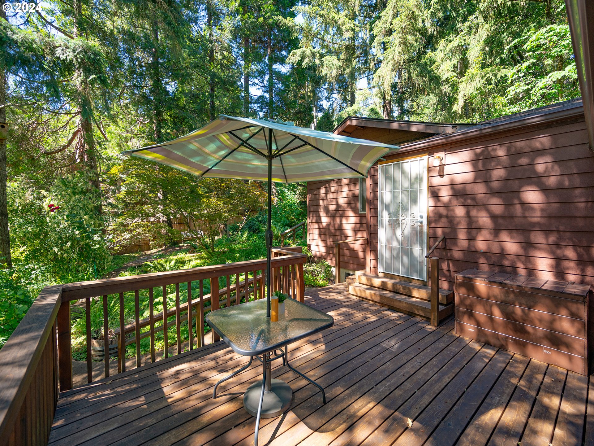 1778 West 27th Place Eugene, OR 97405 - Photo 32 of 43 a view of balcony with wooden floor and outdoor seating